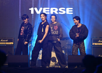 This picture taken on November 25, 2024 shows K-pop group 1Verse members (L-R) Seok, Aito, Kenny and Hyuk performing during a music festival in Suwon. 1Verse is a new five-member K-pop band: Chinese-American Kenny, Aito from Japan, Lao-Thai American Nathan, and Seok and Hyuk from North Korea who defected to the South. (Photo by Jung Yeon-je / AFP) / TO GO WITH AFP STORY SKorea-NKorea-defector-kpop, FOCUS  BY Hieun SHIN (Photo by JUNG YEON-JE/AFP via Getty Images)